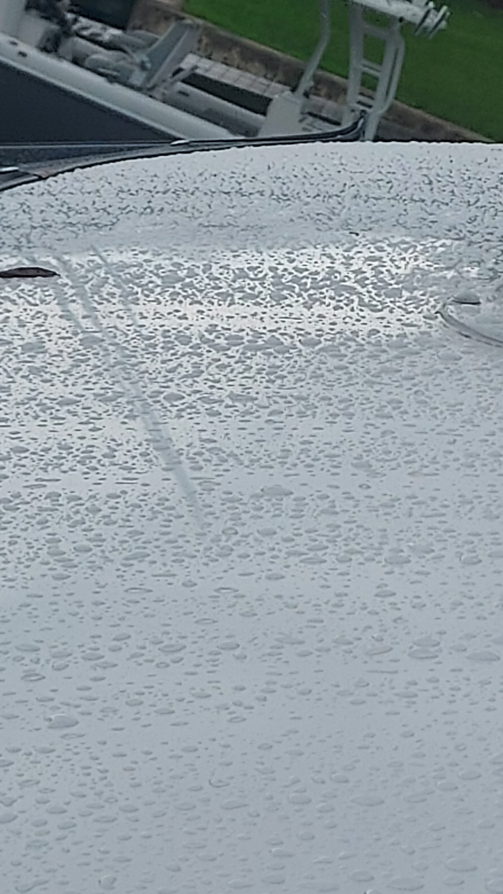 Water beading on a freshly finished white surface